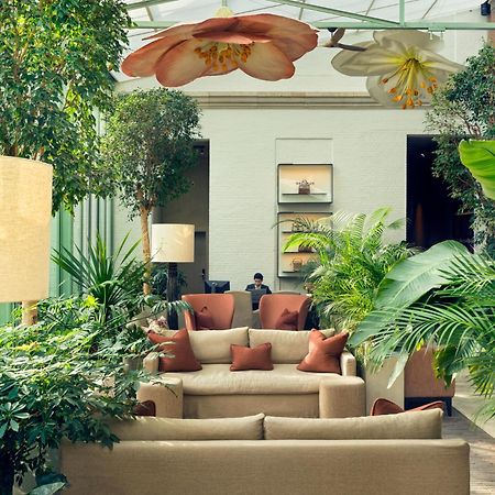 Botanic Sanctuary Antwerp - The Leading Hotels Of The World Exterior photo The conservatory at The Ivy Hotel